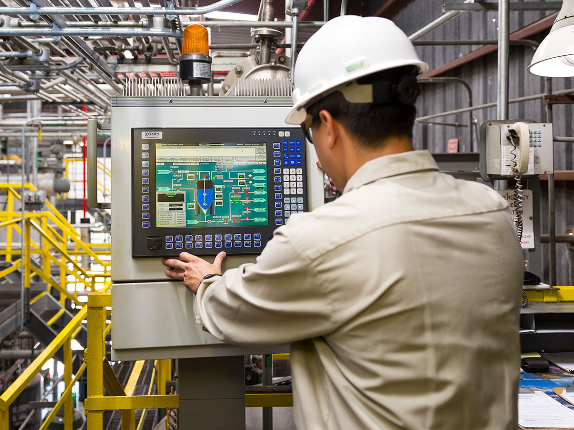 Plant worker using computing machine